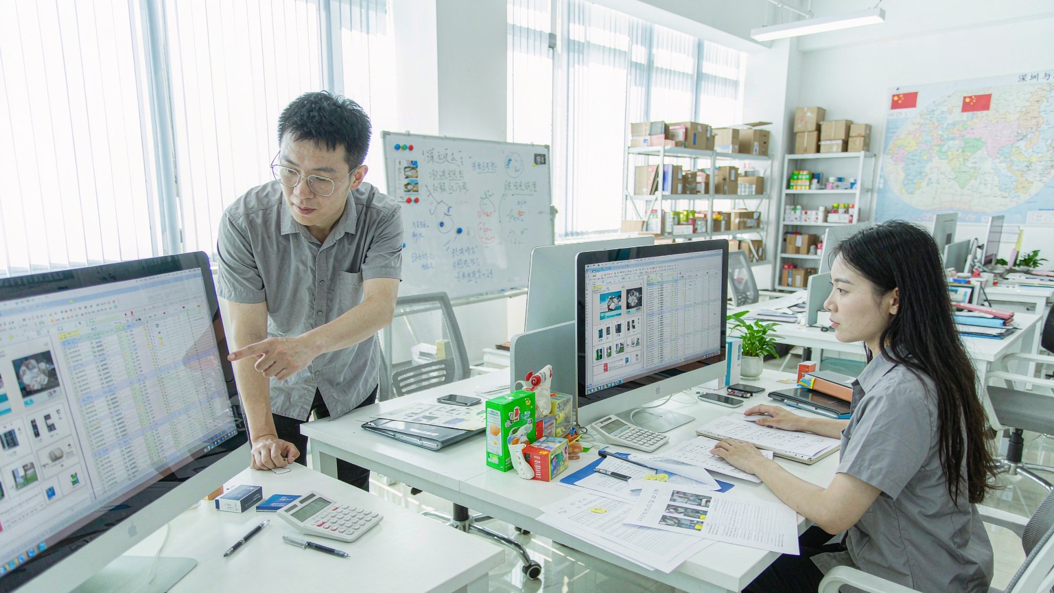 Foreign trade office team in Shenzhen handling client orders